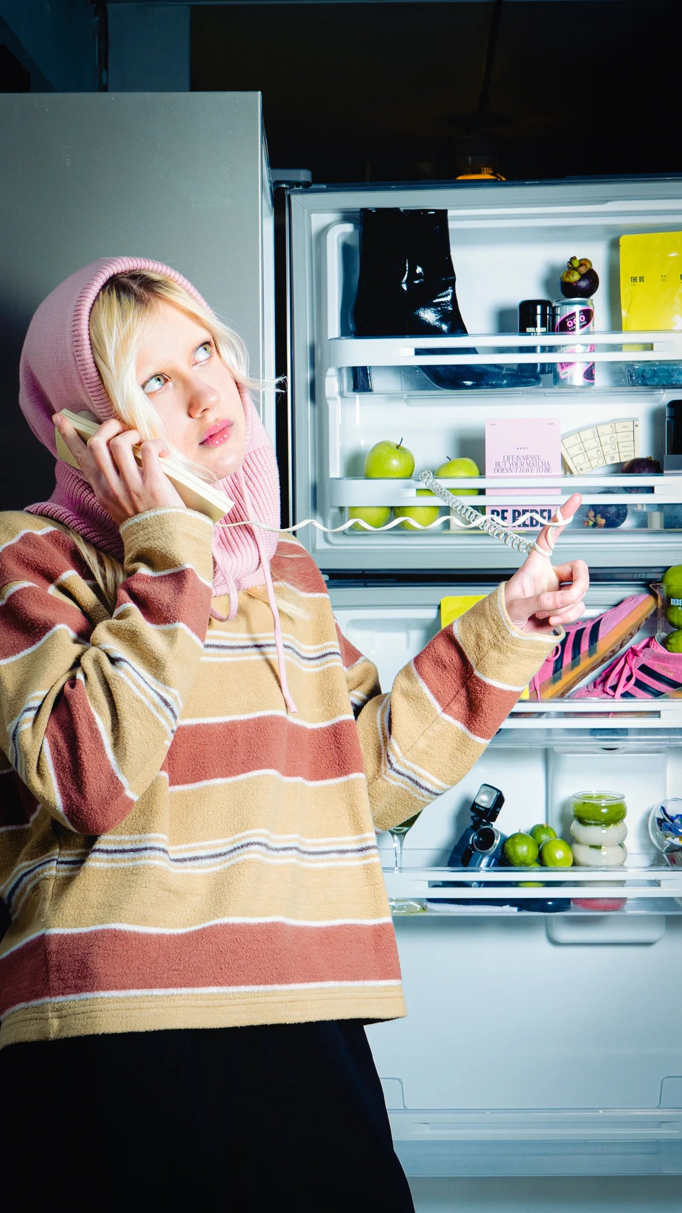 An after-hours phone call beside a fridge stocked with Rebel Bunny matcha.